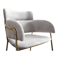 Hoher gepolsterter Hocker mit goldenen Beinen